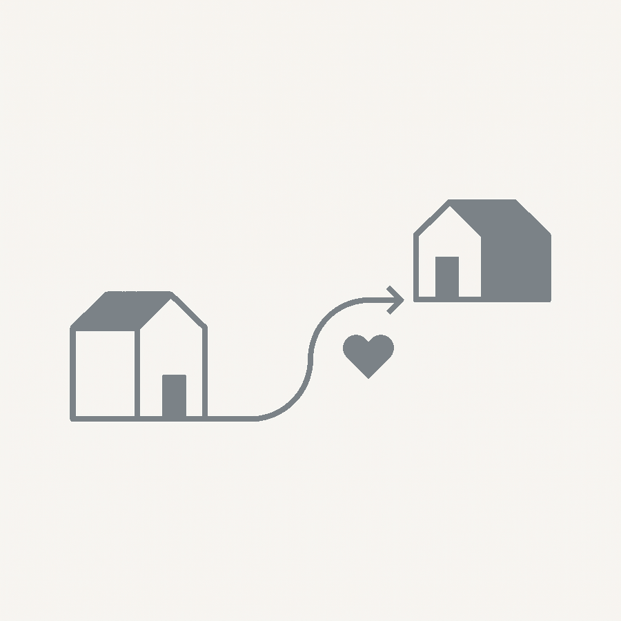 Ilustração de duas casas ligadas por um caminho dourado, com um coração ao centro.